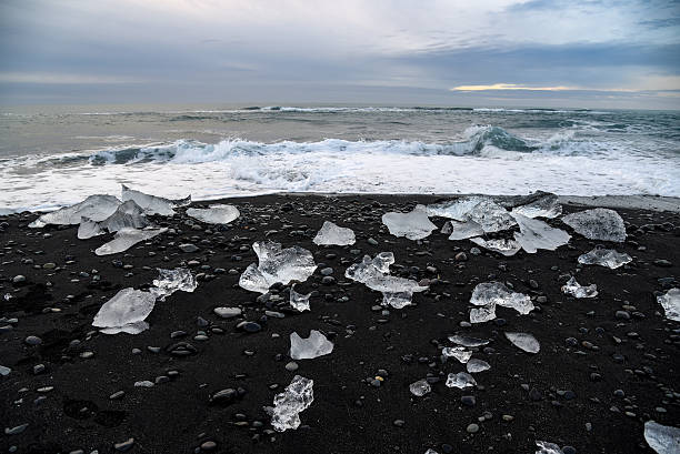istock Icebergs on black volcanic beach, Iceland 586063822