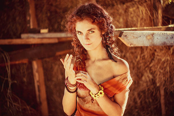 istock girl lying in the straw 586066586
