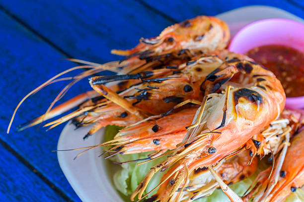 istock grilled shrimp with seafood sauce 586069114