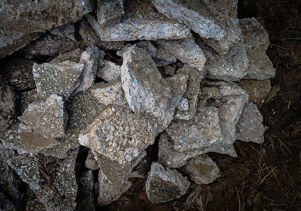 Close focus a pile of destroyed concrete in low light effect.