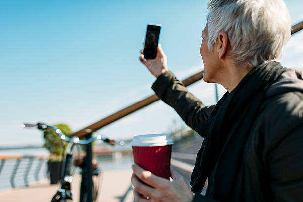 istock Happy Mature Woman Making Selfie. 586070218