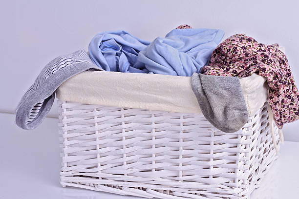 istock Overflowing laundry basket. Household chore concept 586070668
