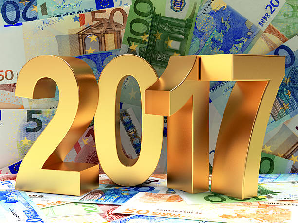 istock 2017 New Year on background of Euro bills. 586072192