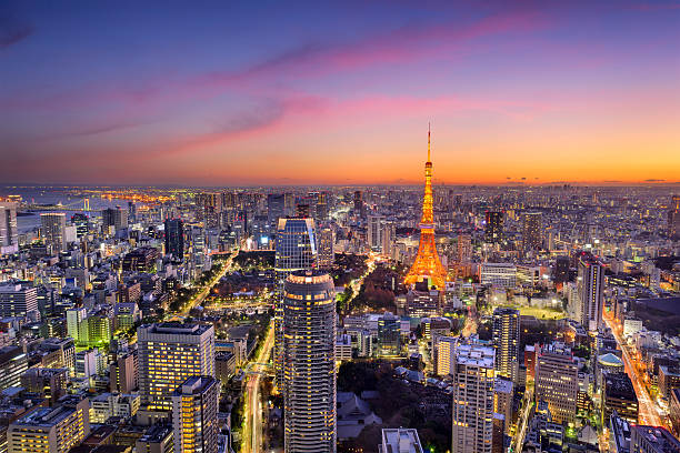 Tokyo, Japan Skyline Tokyo, Japan skyilne at Tokyo Tower. tokyo prefecture tokyo tower japan night stock pictures, royalty-free photos & images