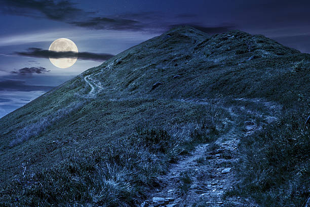 istock footpath to the mountain top at night 586074678
