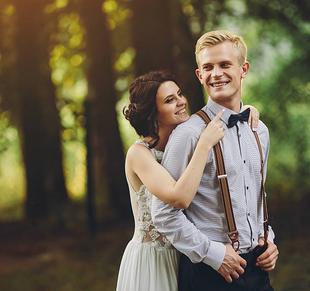istock Beautiful wedding couple posing 586075276