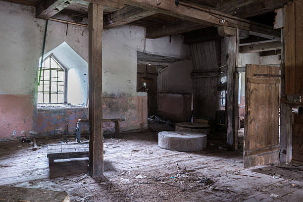 istock inside view of an abandoned water mill 586076484