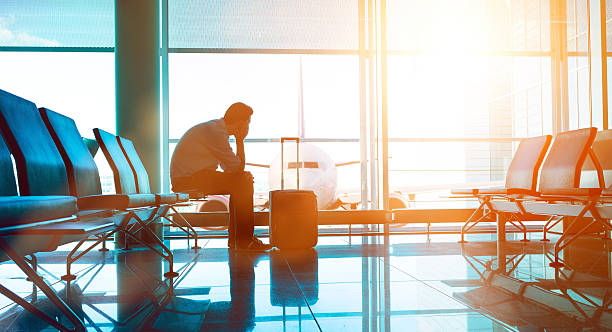 istock Passenger waits for plane in an airport 586076666