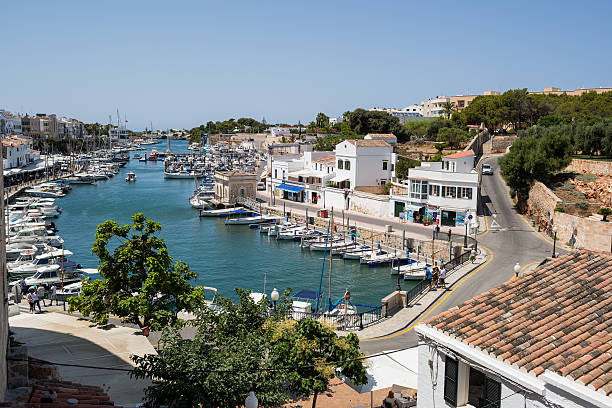 istock Boats in harbour with bridge and houses 586077984