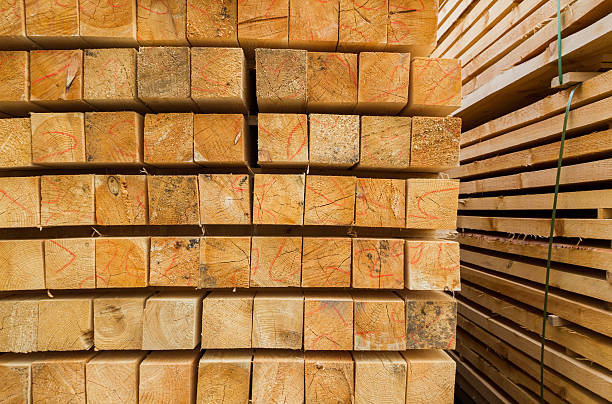 istock Wooden beams on the basis of an open construction 586078446