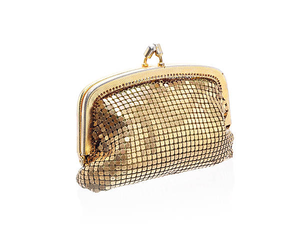 istock Golden coin purse isolated on white 586080618