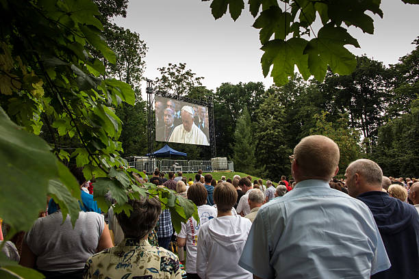 Pilgrims waiting for the arrival of Pope Francis  in Czestochowa  Czestochowa, Poland - July 28, 2016: Pilgrims waiting for the arrival of Pope Francis at Jasna Gora in Czestochowa pope john paul ii stock pictures, royalty-free photos & images