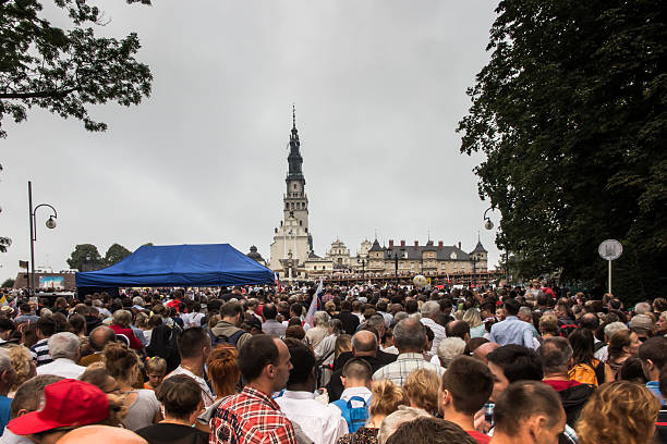 Pilgrims waiting for the arrival of Pope Francis  in Czestochowa  Czestochowa, Poland - July 28, 2016: Pilgrims waiting for the arrival of Pope Francis at Jasna Gora in Czestochowa pope john paul ii stock pictures, royalty-free photos & images
