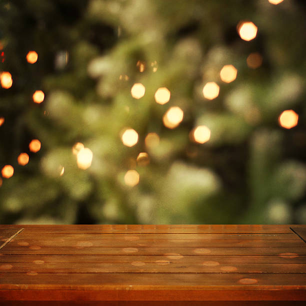 istock Empty wooden table against christmas  background 586086872