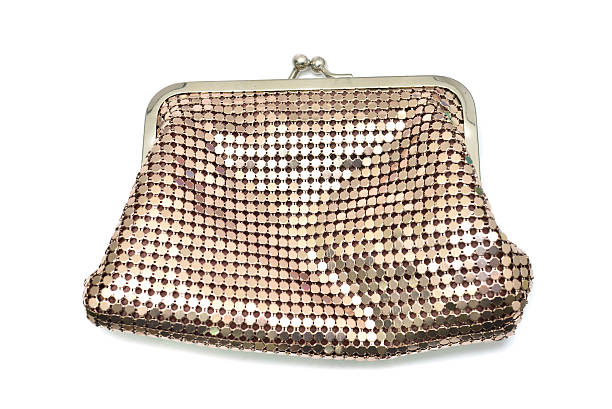 istock Golden coin purse isolated on white 586088682