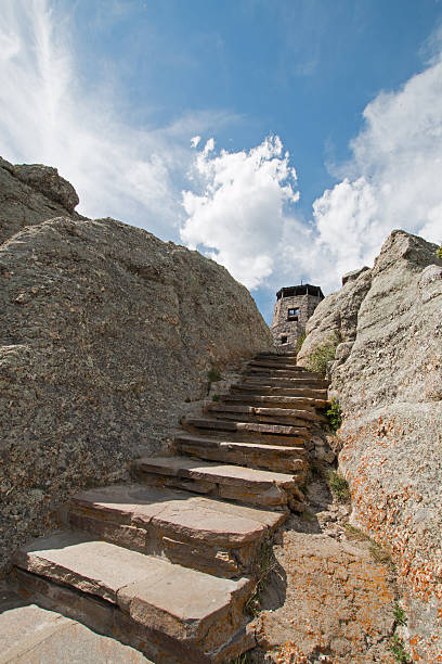 istock Stone steps leading up to Harney Peak Fire Lookout Tower 586090652