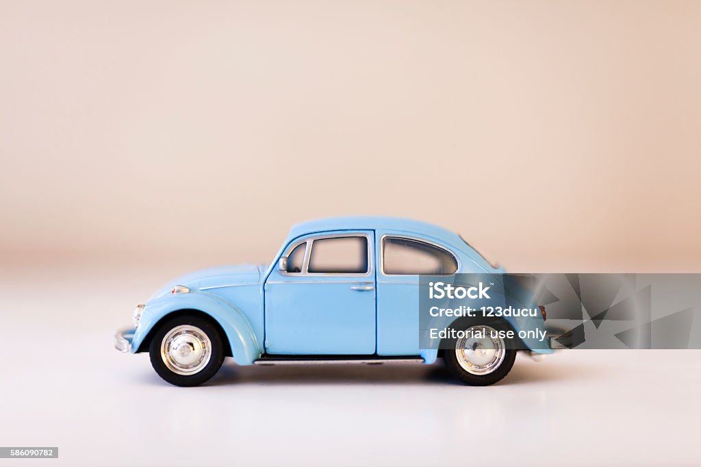 Volkswagen Beetle Izmir, Turkey - July 20, 2016: Vintage toy Volkswagen car close up image on isolated white background. Volkswagen Beetle Stock Photo