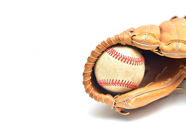istock Baseball glove and ball isolated on white 586090830