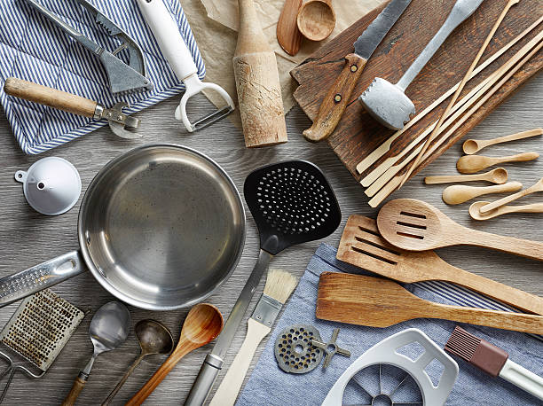 various kitchen utensils various kitchen utensils on wooden table, top view kitchenware shop stock pictures, royalty-free photos & images