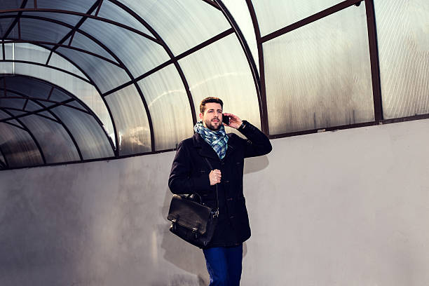 istock man talking on the phone 586171596