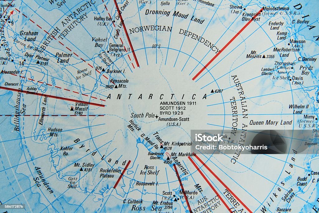 Map of Antarctica A map of Antarctica, centred on the South Pole and noting all the mountains and their heights and as far out as the ice shelf and surrounding seas. Map Stock Photo