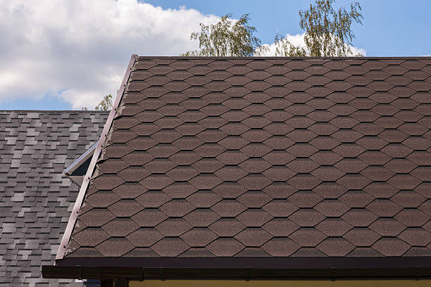 istock Part of red bitumen tiles roof 586172984
