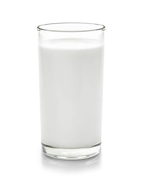 istock glass of milk isolated on white background 586173228
