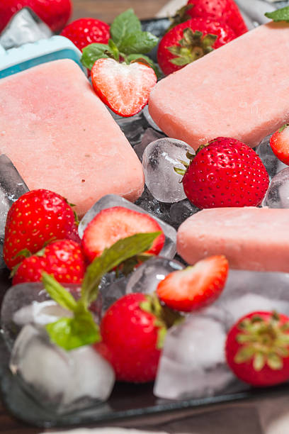 istock Homemade strawberry ice cream or popsicles 586174818