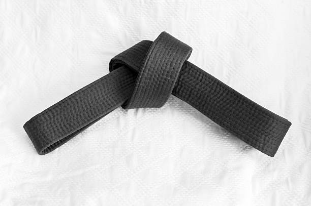 istock Judo belt on white kimono 586176636