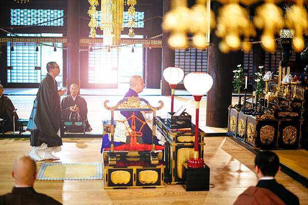istock Monks during prayer in Buddhist shrine in Kyoto 586176790