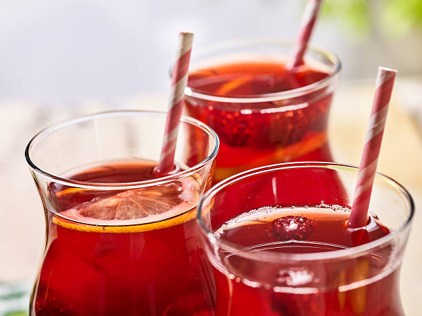 istock On wooden is ice cold beverage glass with berries cocktail . 586178724
