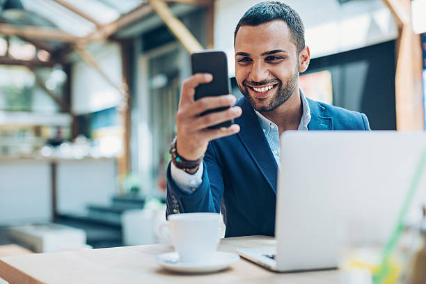 istock Middle Eastern ethnicity businessman texting in cafe 586178952