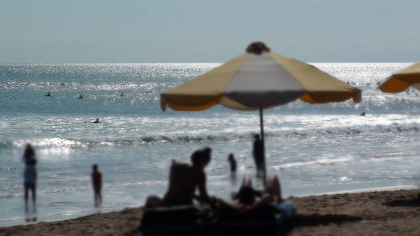 istock Kuta Beach With Unrecognizable People In Bali Indonesia 586179798