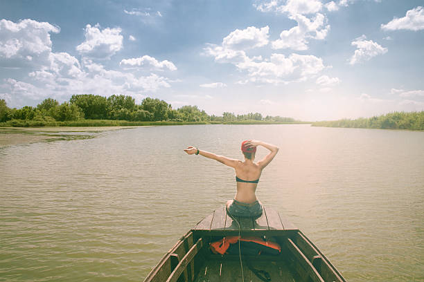 istock Woman enjoy boat ride 586182356