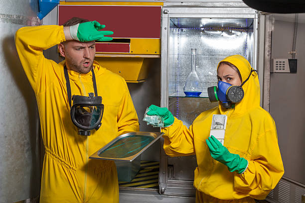 istock Man and woman cooking meth 586184400