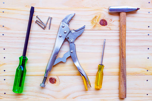 istock Tool equipments on wood background,top view 586185268