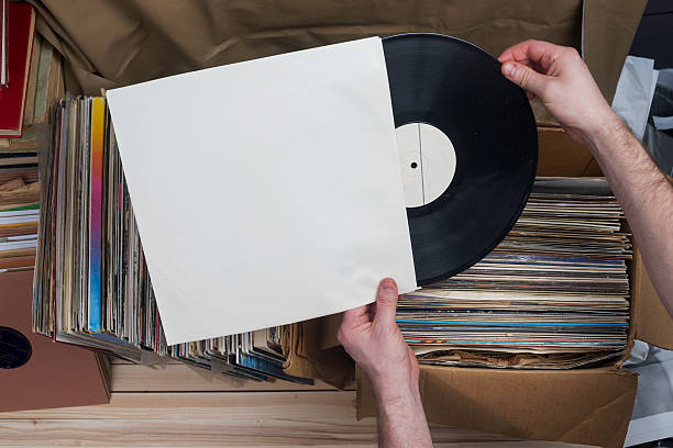 istock Vinyl record with copy space in front of a collection. 586189180