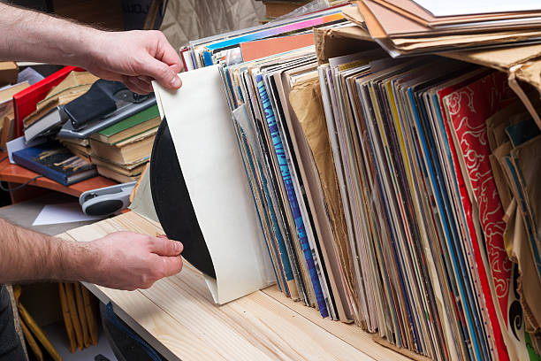 istock Vinyl record with copy space in front of a collection. 586189236