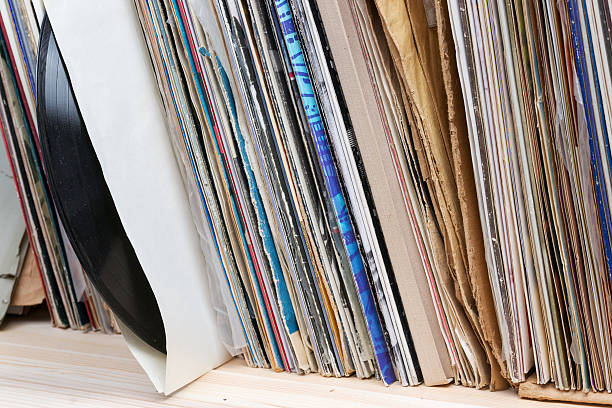 istock Vinyl record with copy space in front of a collection. 586189320