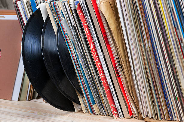 istock Vinyl record with copy space in front of a collection. 586189374