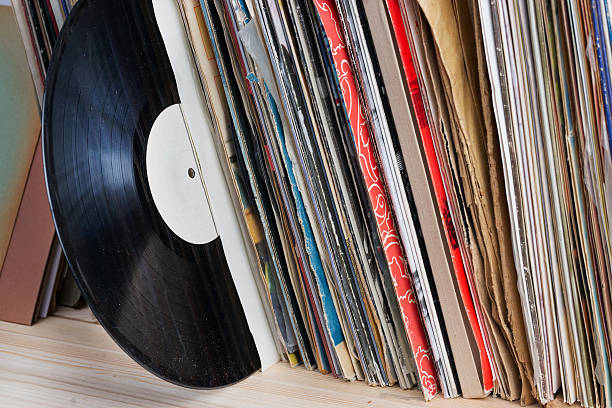 istock Vinyl record with copy space in front of a collection. 586189578