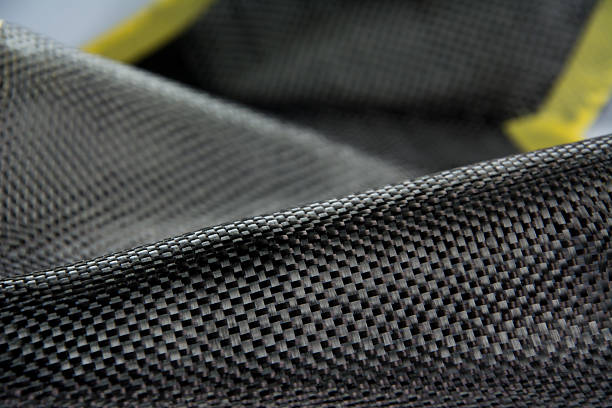istock Carbon fiber composite material background 586189850