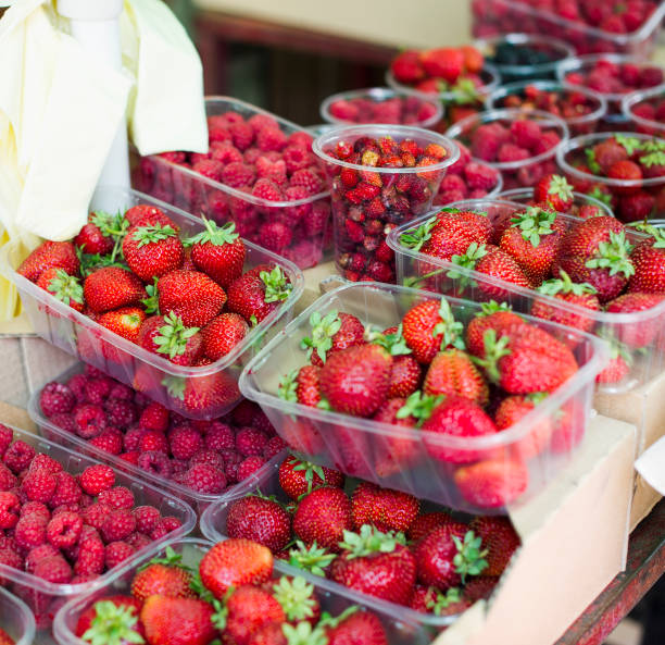 istock Strawberries For Sale in Market 586190094