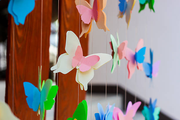 istock butterfly paper on yarn line 586192406
