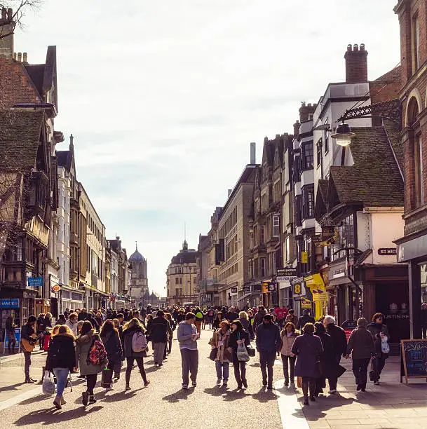One of the busiest shopping streets in Oxford's city centre, with a large number of pedestrians.