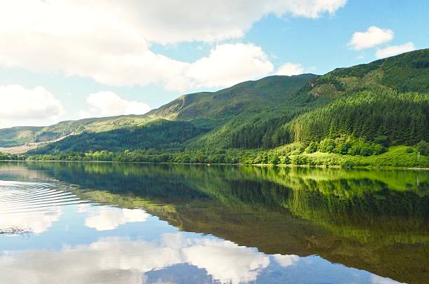istock Lake , big mountain and blue sky in Scotland 586194636