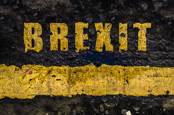 istock Grungy Yellow Brexit Road Markings 586195518