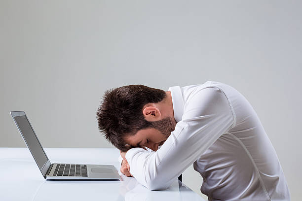 istock emotional man and laptop 586196716
