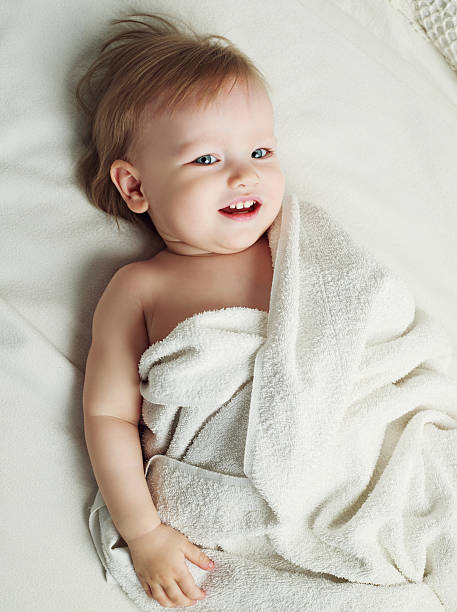 istock baby with towels 586198520
