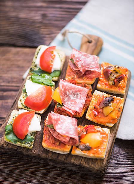 istock antipasti tapas served on wooden board 586199142
